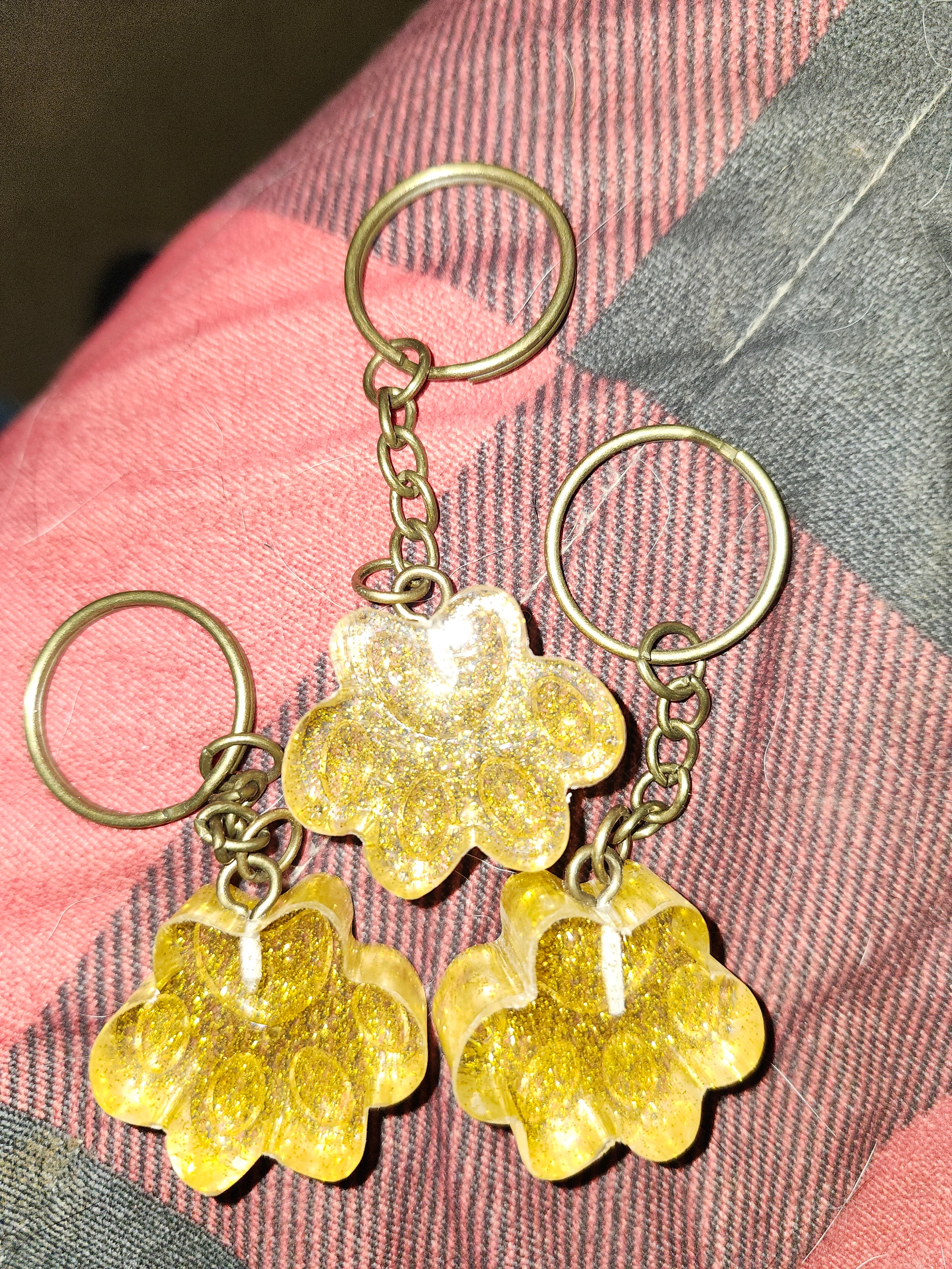 Gold paw print keychains